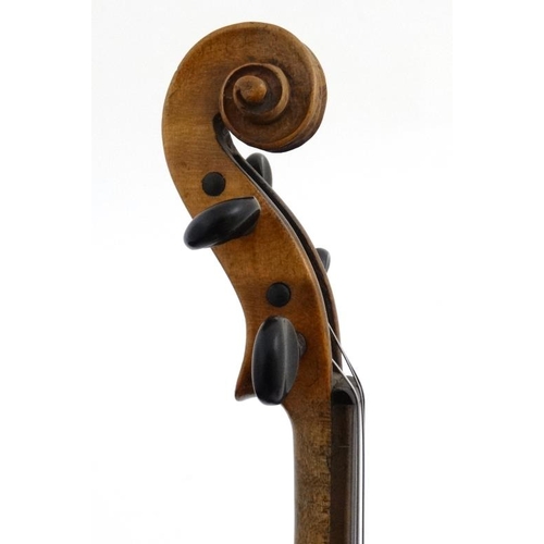 394 - Musical Instruments : An early to mid 20thC Violin , bears label within for ' Copy of Antonius Strad... 