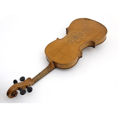 394 - Musical Instruments : An early to mid 20thC Violin , bears label within for ' Copy of Antonius Strad... 