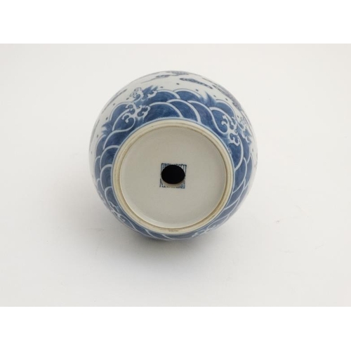 406 - A Chinese blue and white double gourd vase , decorated with 5 clawed dragons and flaming pearls of w... 