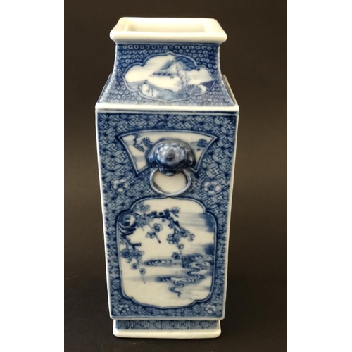 417 - A Chinese blue and white two handled vase of squared form , the handles formed as the heads of Dogs ... 