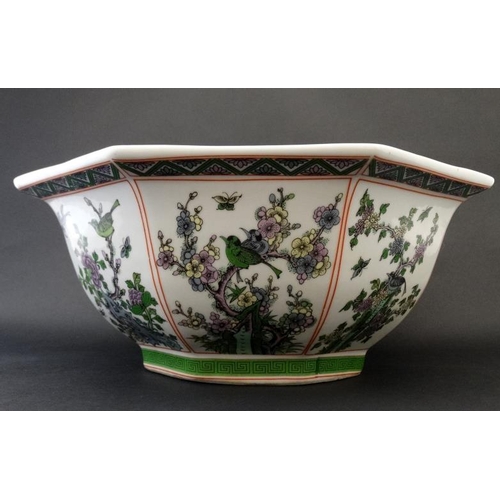 442 - A large Chinese bowl of tapering octagonal form , the 8 panels decorated in shades of green, purple ... 