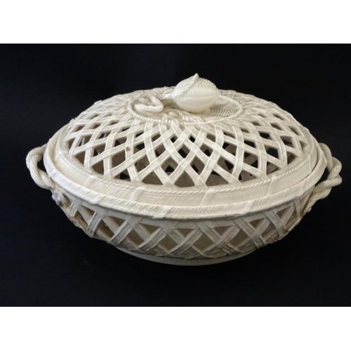 466 - A Leedsware Classical Creamware pierced chestnut basket and stand , having weaved handles and fruit ... 