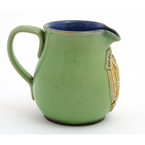 488 - A Royal Doulton 'Greene King , Fine Suffolk Ales ' pub jug , having applied Greene King brewery moti... 