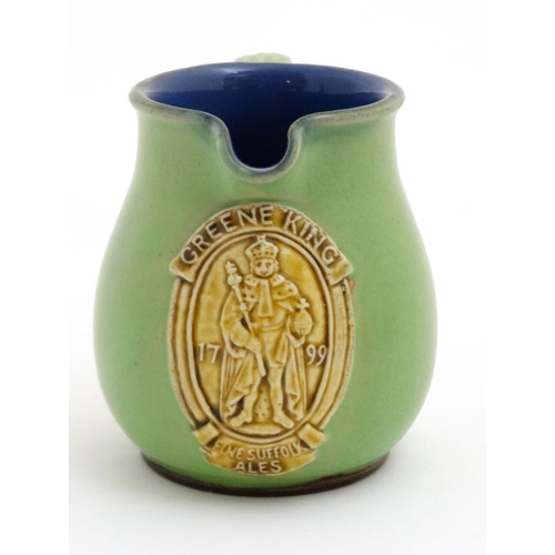 488 - A Royal Doulton 'Greene King , Fine Suffolk Ales ' pub jug , having applied Greene King brewery moti... 