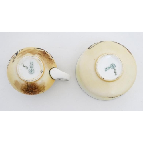 491 - An early - mid 20thC Royal Doulton ''Coaching Days'' series two place tea set, comprising tea pot, 2... 