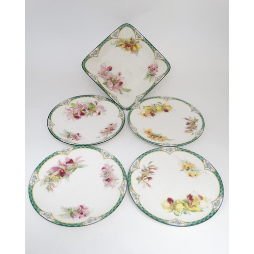 493 - A set of four 'Royal Doulton Plates and a sweet meat dish in the ''orchid '' pattern. Green factory ... 