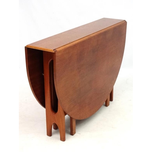 21 - Vintage  Retro : an English folding Sutherland style 6 leg mahogany together with 4 G-Plan Style sha... 