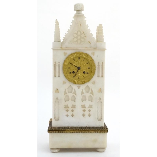 28 - French Alabaster Cathedral Clock : An 8 day Silk Suspension mantle clock striking on a bell with out... 