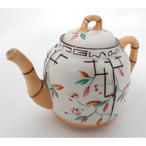 40 - Japanese oriental style teapot  Please Note -  we do not make reference to the condition of lots wit... 