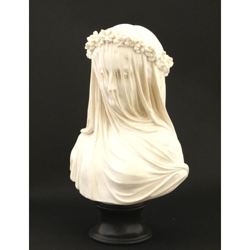 46 - A Continental composite marble bust depicting veiled lady on turned base. 21stC approx 14'' high  Pl... 