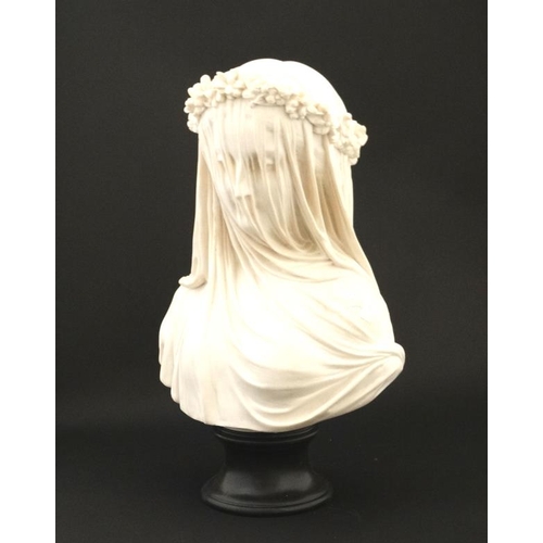 46 - A Continental composite marble bust depicting veiled lady on turned base. 21stC approx 14'' high  Pl... 