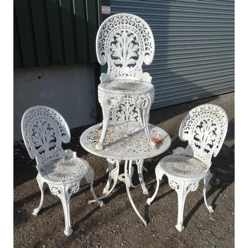 591 - Circular garden table & 4 chairs