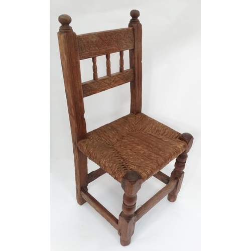 9 - Carved rush seated chair  Please Note -  we do not make reference to the condition of lots within ca... 