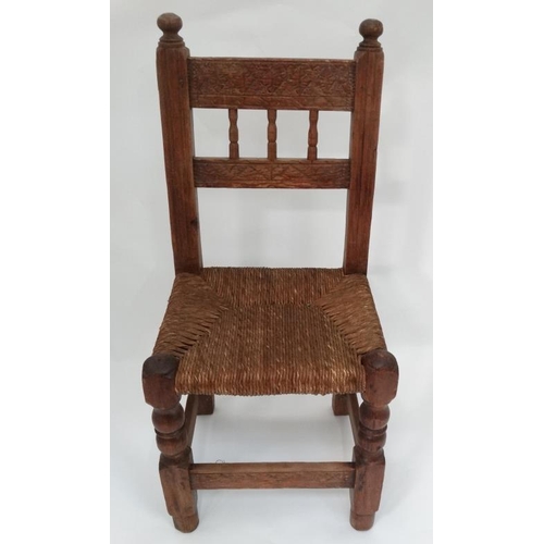 9 - Carved rush seated chair  Please Note -  we do not make reference to the condition of lots within ca... 