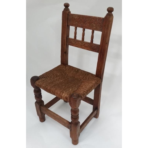 9 - Carved rush seated chair  Please Note -  we do not make reference to the condition of lots within ca... 