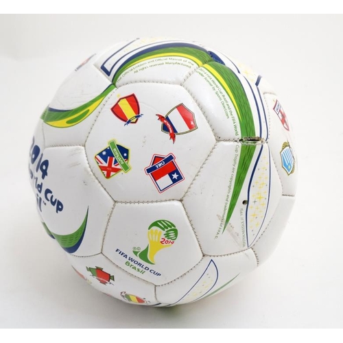 110 - Football: A 2014 Fifa Brazil World Cup commemorative football, decorated with participating country ... 