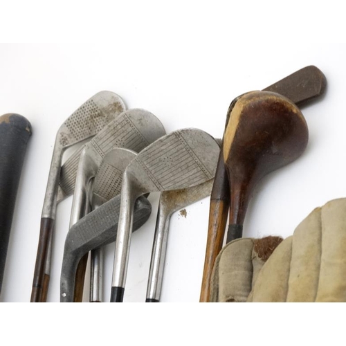 121 - Golf and Cricket: A collection of 10 adults and child's wooden golf clubs to include examples by A G... 