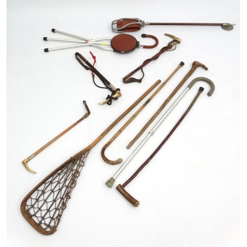 125 - A collection of sticks to include 3 antler handled riding sticks, including a c1900 example by Brigg... 