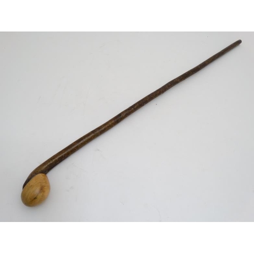 126 - Walking Stick : A Hazel Shafted hand made Walking Stick with brass ferule and ball ended / palm swel... 