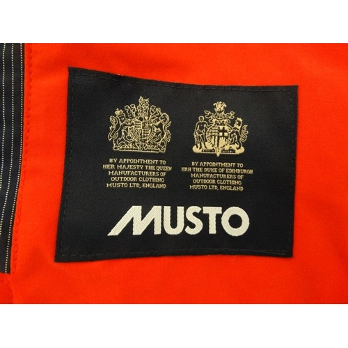 161 - Musto Waterproof Mac , in Summer Red, size 8.