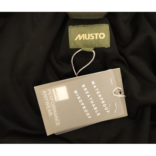 165 - A pair of Musto '' Country Over Leggings '' in Dark Green, Size S.