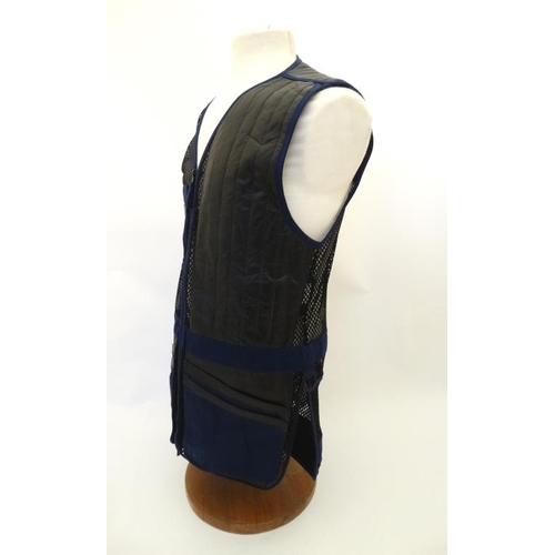 171 - A Deerhunter Champ Deluxe Mesh back , left handed skeet vest in Navy, size S