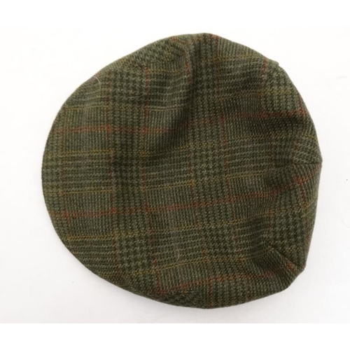 181 - A Laksen ' Bruar ' Tweed Sixpence Flat Cap, Size 57''.