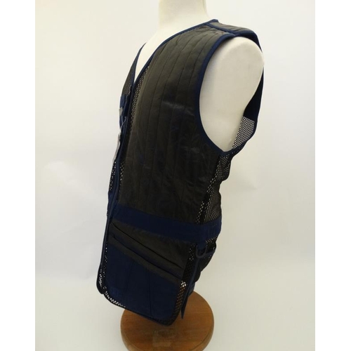 183 - A Deerhunter Champ Deluxe Mesh back , left handed skeet vest in Navy, size S