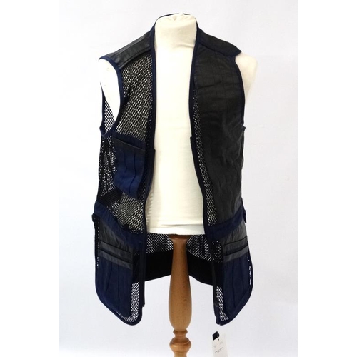 194 - A Deerhunter Champ Deluxe Mesh back , left handed skeet vest in Navy, size M.