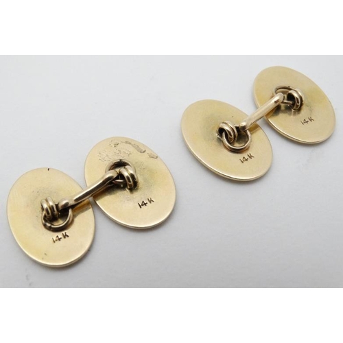 206 - Equine Interest : A pair of 14ct gold cufflink with horse decoration