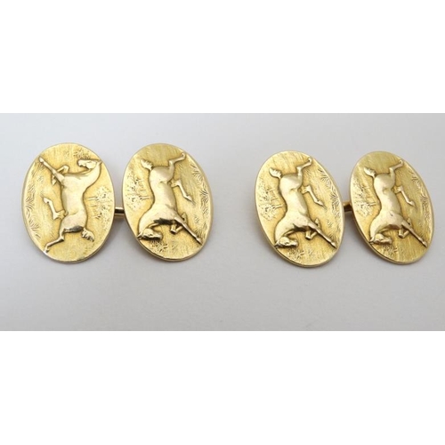 206 - Equine Interest : A pair of 14ct gold cufflink with horse decoration