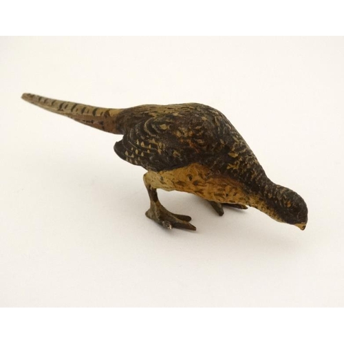 209 - A cold painted bronze model of a hen pheasant. Late 20thC.  3 1/4'' long