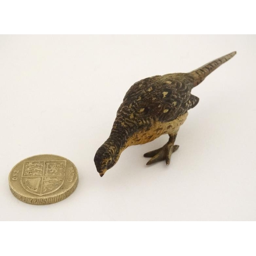 209 - A cold painted bronze model of a hen pheasant. Late 20thC.  3 1/4'' long