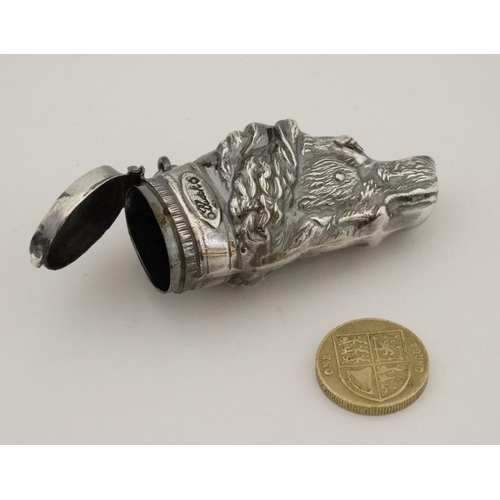 214 - A silver plate novelty vesta formed as a dogs head. 21stC . Approx 2 1/2'' long.