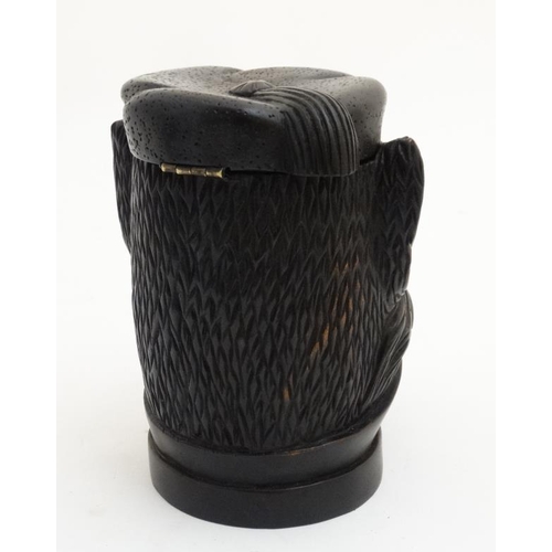 218 - Black Forest : a 20 thC carved wooden novelty Tobacco jar in the form of a Cigar smoking and tassel ... 