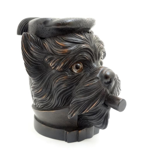 218 - Black Forest : a 20 thC carved wooden novelty Tobacco jar in the form of a Cigar smoking and tassel ... 