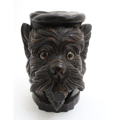 218 - Black Forest : a 20 thC carved wooden novelty Tobacco jar in the form of a Cigar smoking and tassel ... 