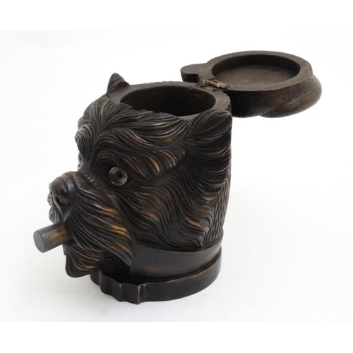 218 - Black Forest : a 20 thC carved wooden novelty Tobacco jar in the form of a Cigar smoking and tassel ... 