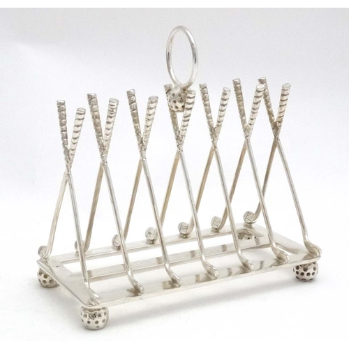 238 - A novelty 6-slice silver plated toast rack, the bars formed as crossed golf clubs. 21stC  Approx 6 1... 