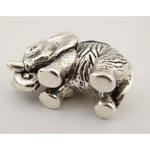 248 - A novelty pin cushion formed as an elephant. Marked 'Sterling' 21stC 1 1/2'' long