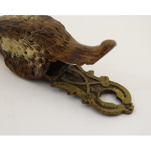 249 - A novelty desk top letter / pepper clip formed as the head of a game bird, with cold painted decorat... 