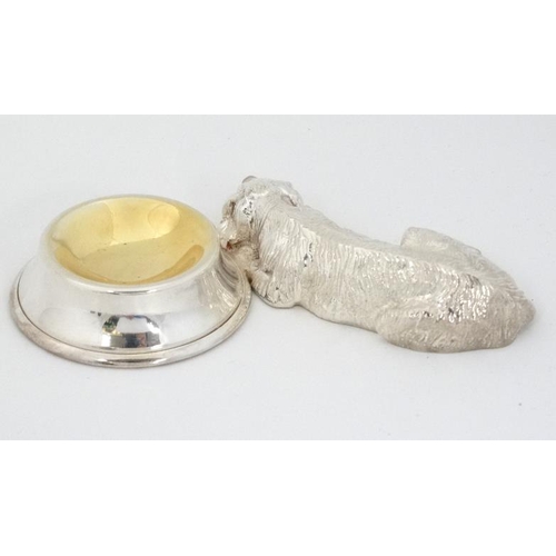 255 - A pair of novelty silver plate table salts formed as dogs laying before bowls. 21stC . Approx 5'' lo... 