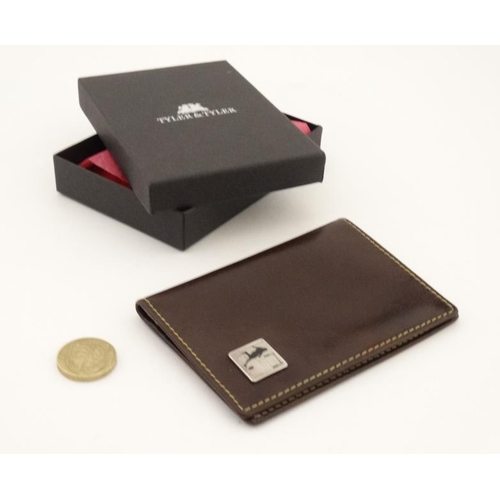 257 - Rugby interest: A Tyler & Tyler leather card holder with image to one corner of a rugby player in si... 