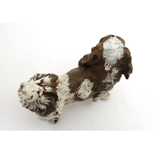 264 - Cold Painted Bronze : a scale  figure in liver and white of a Pekinese dog , marked ' Geshultz ' und... 