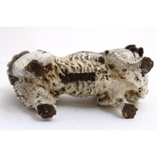 264 - Cold Painted Bronze : a scale  figure in liver and white of a Pekinese dog , marked ' Geshultz ' und... 