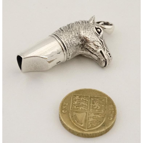 266 - A silver whistle with horsehead decoration. marked '925 Sterling '. 21stC.  approx 1 3/4'' long