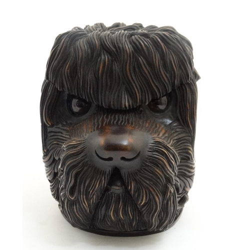 268 - Black Forest : a 20thC tobacco Jar in the form of a shaggy dog with glass eyes , 7 1/4'' high