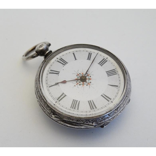 269 - A ladies hallmarked silver pocket watch with later applied ceramic cabochon decorated with  head of ... 