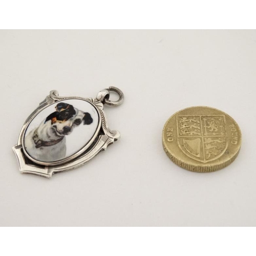 270 - Similar to previous lot - Dog Interest : A hallmarked silver fob with later applied ceramic cabochon... 