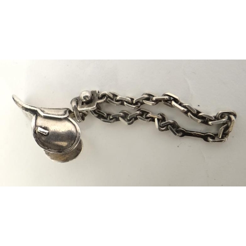 271 - A white metal chain and pendant fob / charm formed as a miniature saddle. Engraved Pour Les 2000 d'Y... 